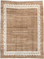 7' x 9' one-of-a-kind handmade vintage Tibetan rug. Color palette: camel, ivory, taupe, beige, cream, gray
