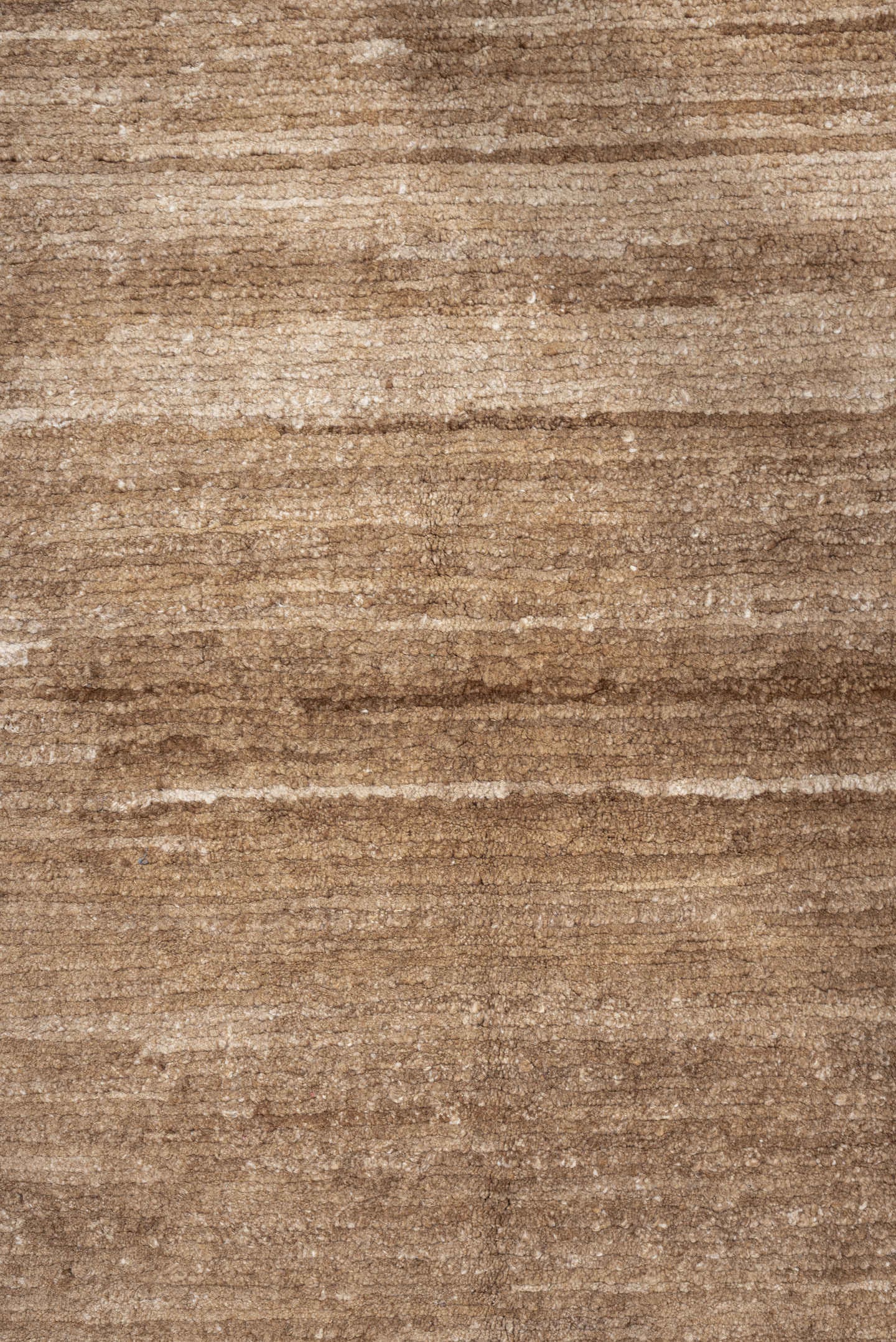 7' x 9' one-of-a-kind handmade vintage Tibetan rug. Color palette: camel, ivory, taupe, beige, cream, gray