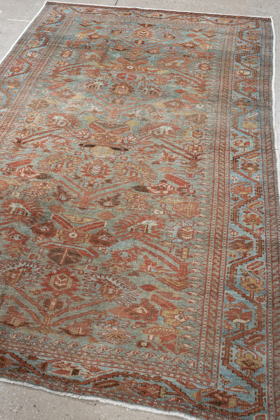 4' x 6' one-of-a-kind handmade antique Farahan small size rug. Color palette: light blue, rust, camel, brown, ivory, taupe