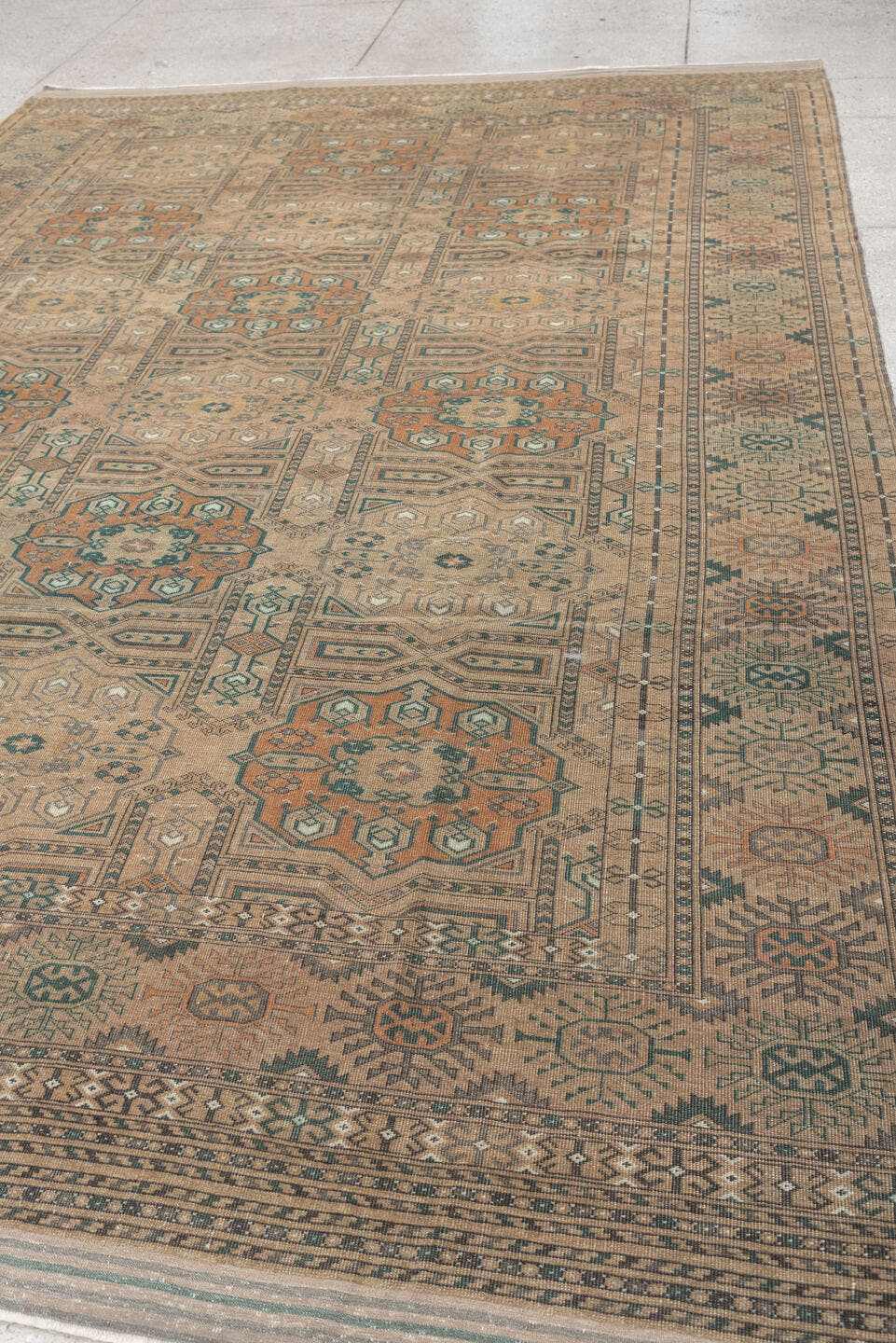 7' x 10' one-of-a-kind handmade antique Yamoud large size rug. Color palette: camel, taupe, terracotta, dusty teal, ivory
