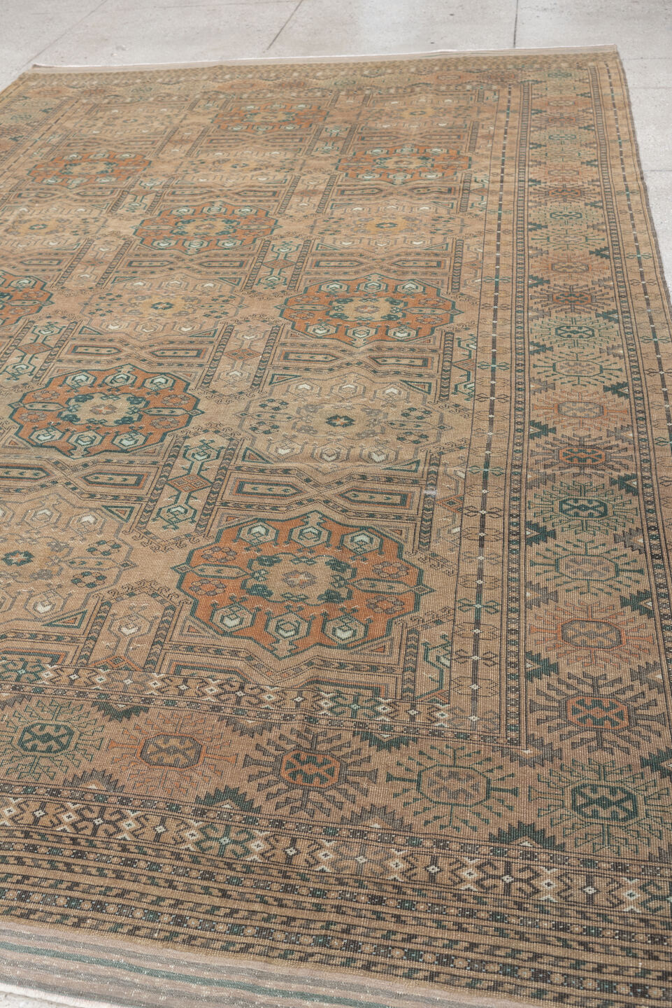7' x 10' one-of-a-kind handmade antique Yamoud large size rug. Color palette: camel, taupe, terracotta, dusty teal, ivory
