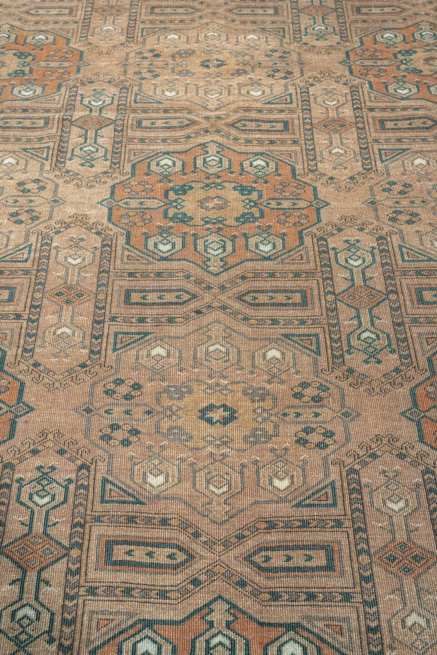 7' x 10' one-of-a-kind handmade antique Yamoud large size rug. Color palette: camel, taupe, terracotta, dusty teal, ivory
