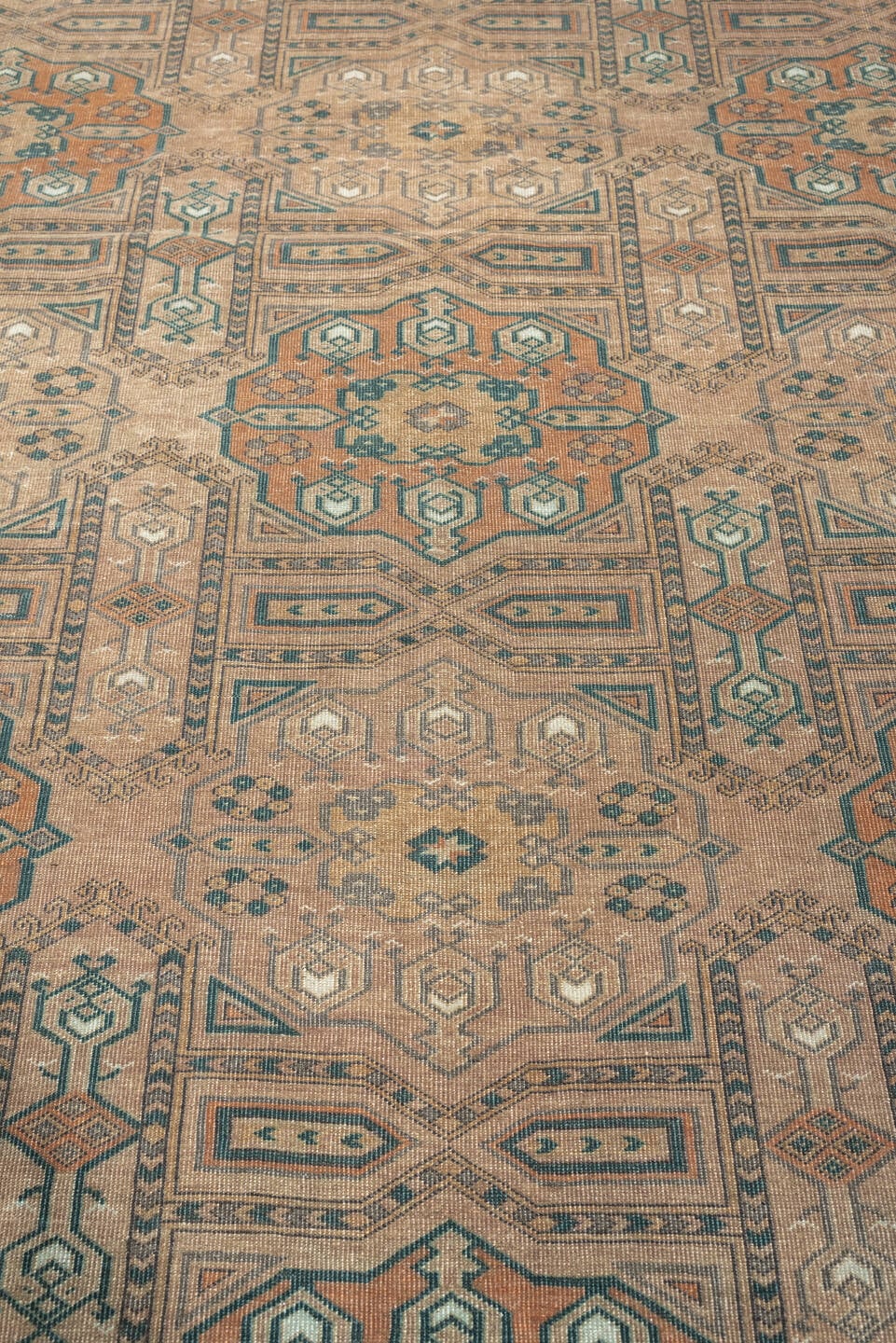 7' x 10' one-of-a-kind handmade antique Yamoud large size rug. Color palette: camel, taupe, terracotta, dusty teal, ivory