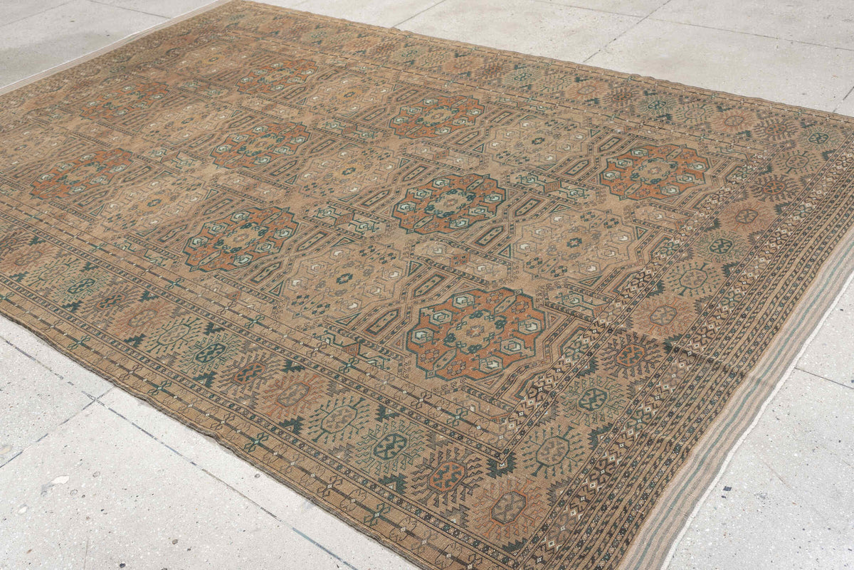 7' x 10' one-of-a-kind handmade antique Yamoud large size rug. Color palette: camel, taupe, terracotta, dusty teal, ivory