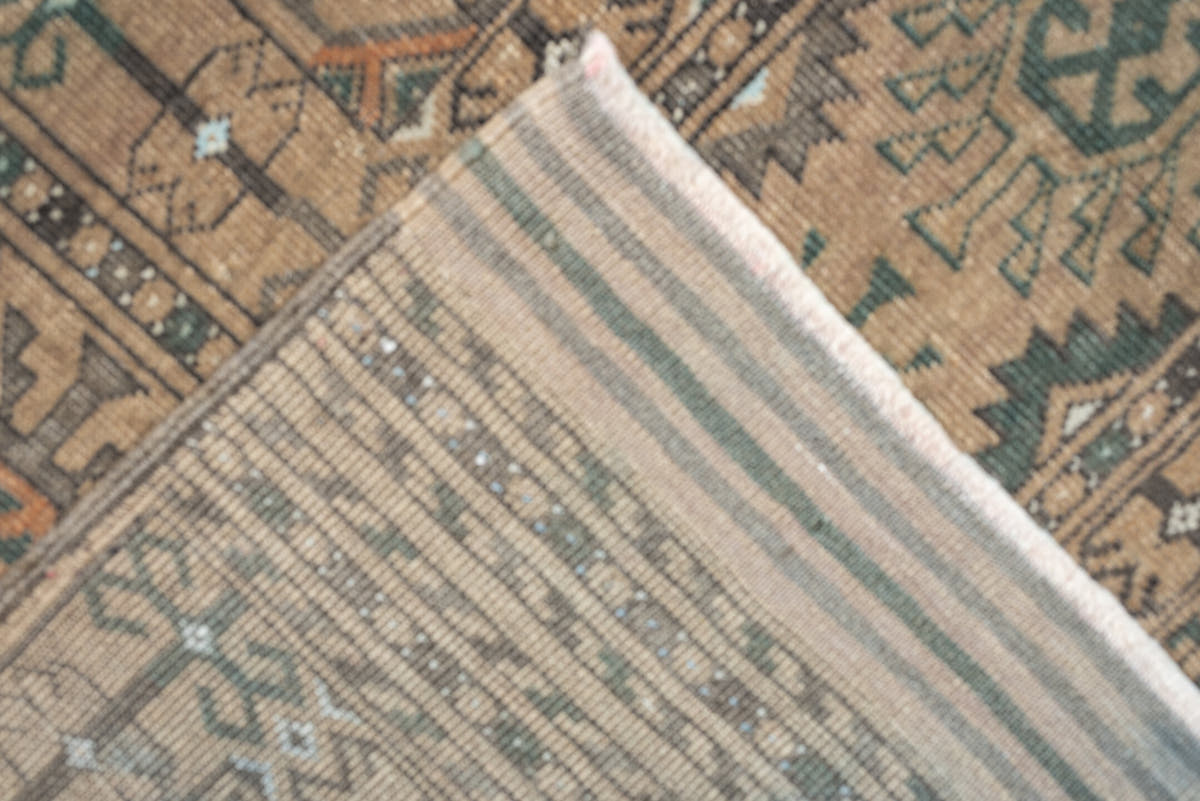 7' x 10' one-of-a-kind handmade antique Yamoud large size rug. Color palette: camel, taupe, terracotta, dusty teal, ivory
