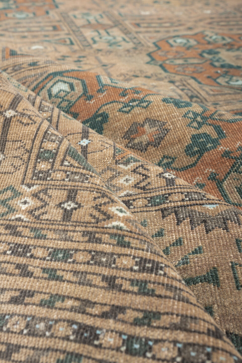 7' x 10' one-of-a-kind handmade antique Yamoud large size rug. Color palette: camel, taupe, terracotta, dusty teal, ivory