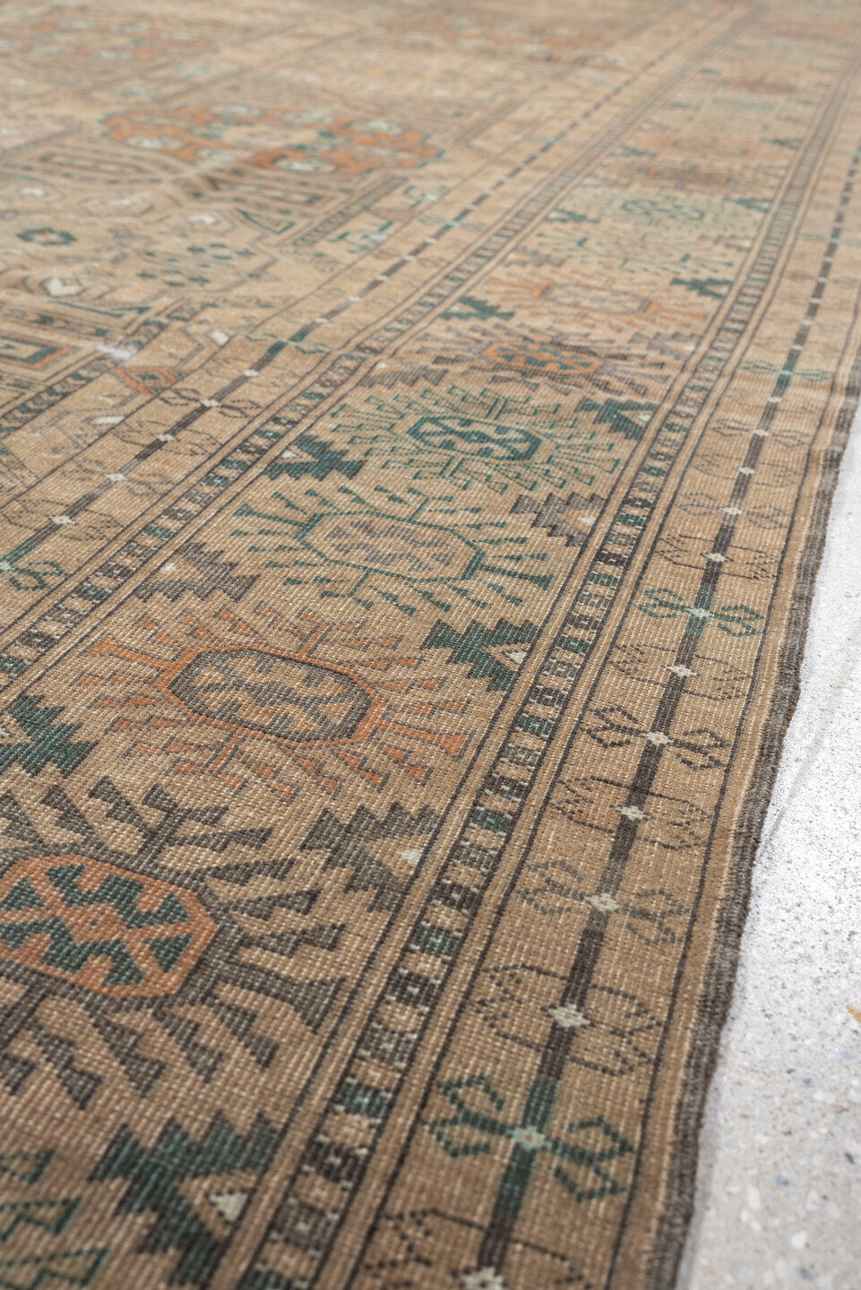 7' x 10' one-of-a-kind handmade antique Yamoud large size rug. Color palette: camel, taupe, terracotta, dusty teal, ivory