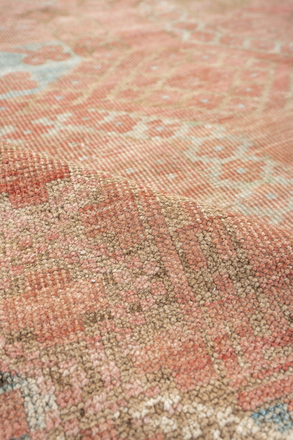 6' x 9' one-of-a-kind handmade antique Afghan large size rug. Color palette: coral, camel, pale blue, taupe, ivory, rose
