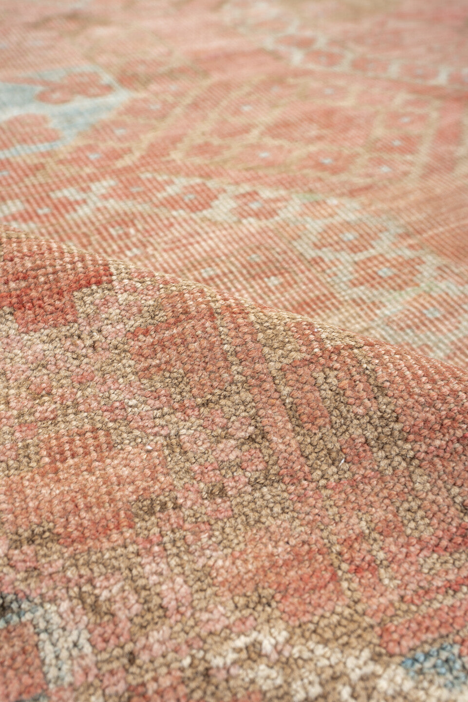 6' x 9' one-of-a-kind handmade antique Afghan large size rug. Color palette: coral, camel, pale blue, taupe, ivory, rose