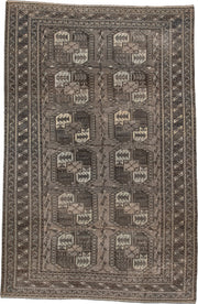 7' x 10' one-of-a-kind handmade antique Afghan large size rug. Color palette: taupe, brown, ivory, charcoal, slate, camel