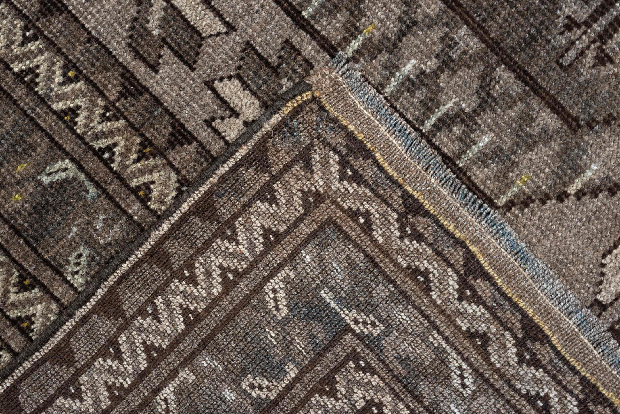 7' x 10' one-of-a-kind handmade antique Afghan large size rug. Color palette: taupe, brown, ivory, charcoal, slate, camel