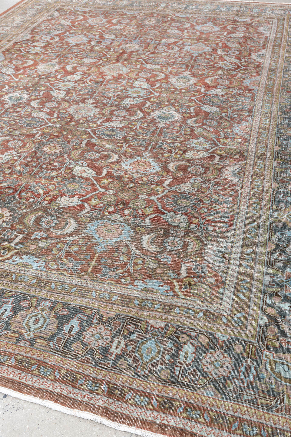 9' x 12' one-of-a-kind handmade antique Mahal large size rug. Color palette: rust, celadon, charcoal, ivory, sage