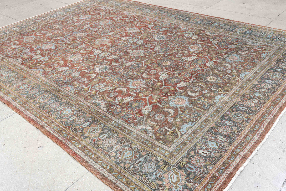 9' x 12' one-of-a-kind handmade antique Mahal large size rug. Color palette: rust, celadon, charcoal, ivory, sage