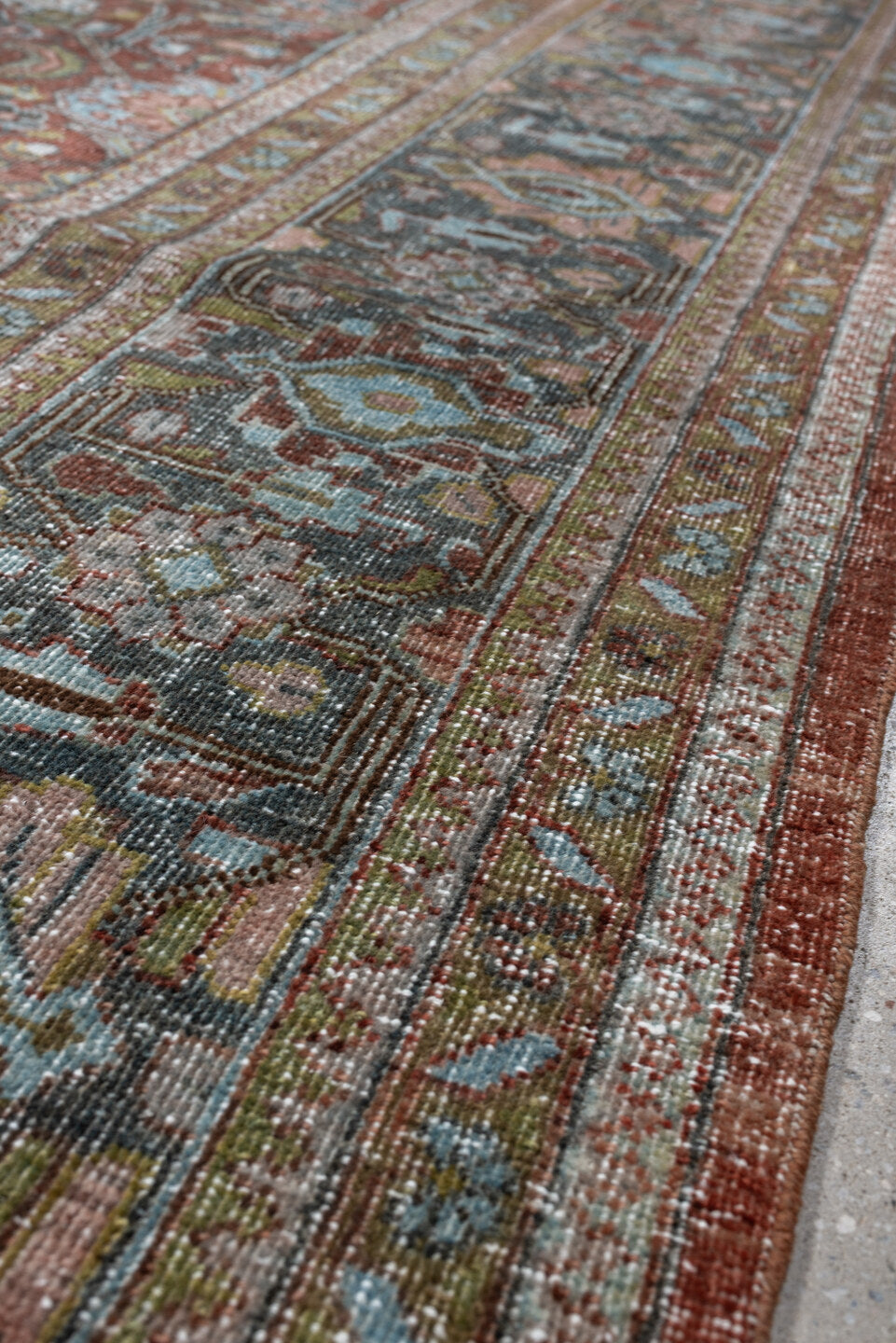 9' x 12' one-of-a-kind handmade antique Mahal large size rug. Color palette: rust, celadon, charcoal, ivory, sage