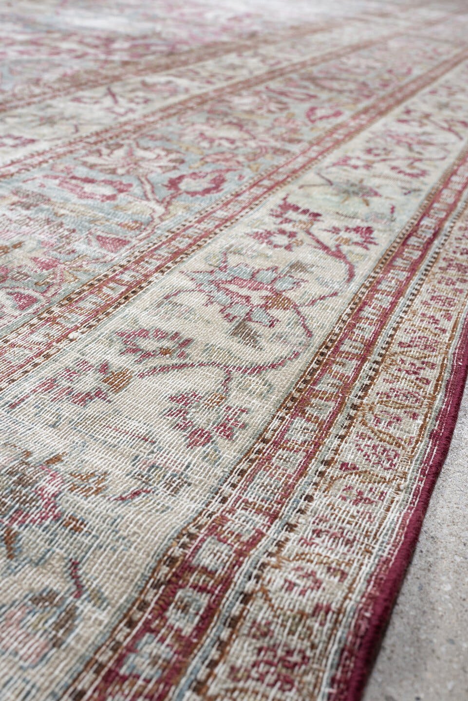11' x 17' one-of-a-kind handmade antique Khorassan oversize rug. Color palette: ivory, powder blue, dusty rose, burgundy