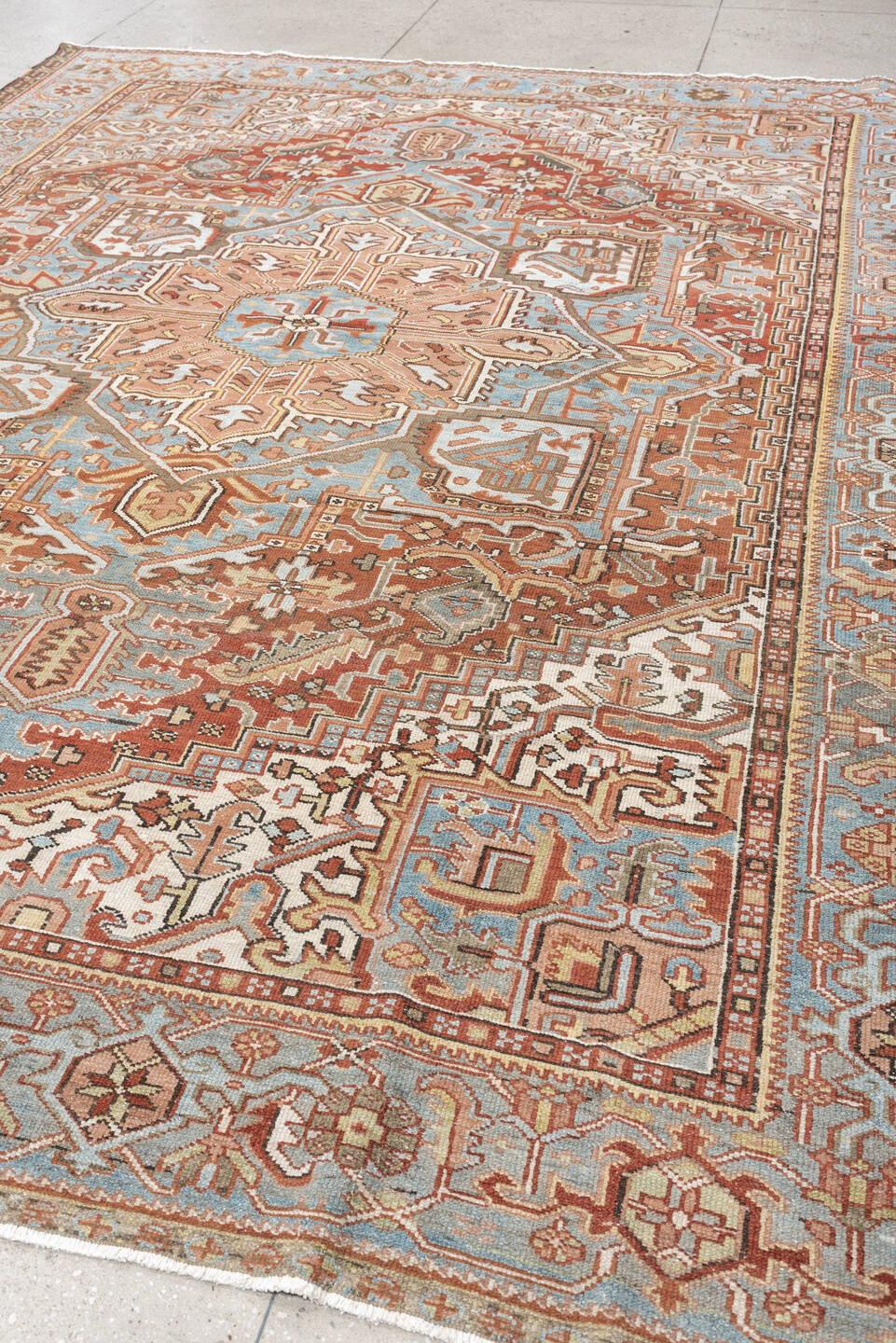 8' x 11' one-of-a-kind handmade antique Karaje large size rug. Color palette: sky blue, terracotta, ivory, rust, dusty rose