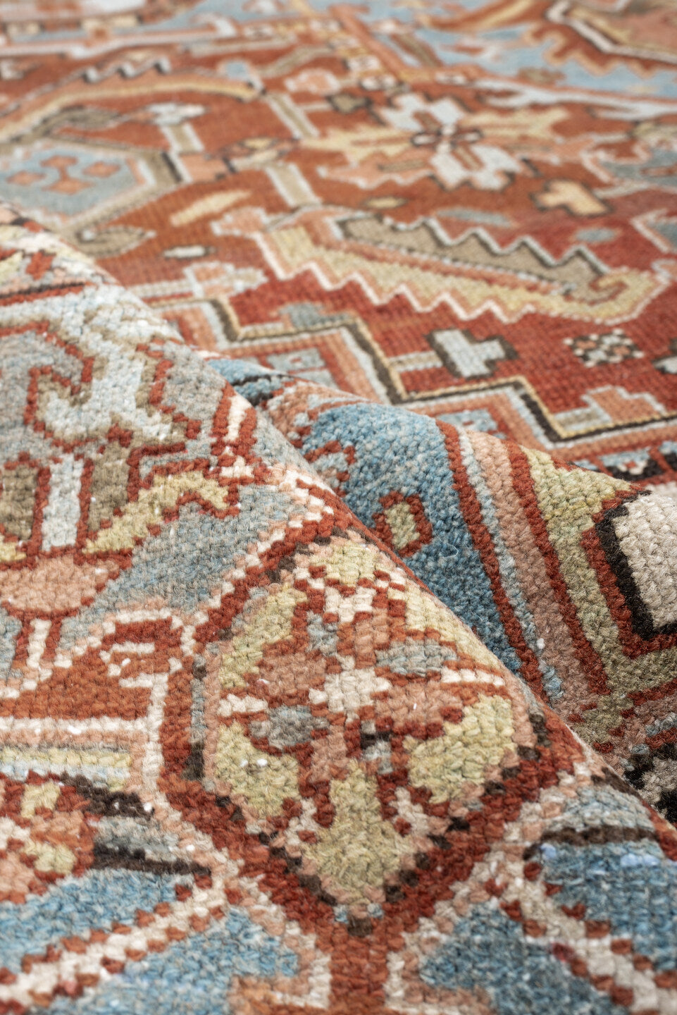 8' x 11' one-of-a-kind handmade antique Karaje large size rug. Color palette: sky blue, terracotta, ivory, rust, dusty rose