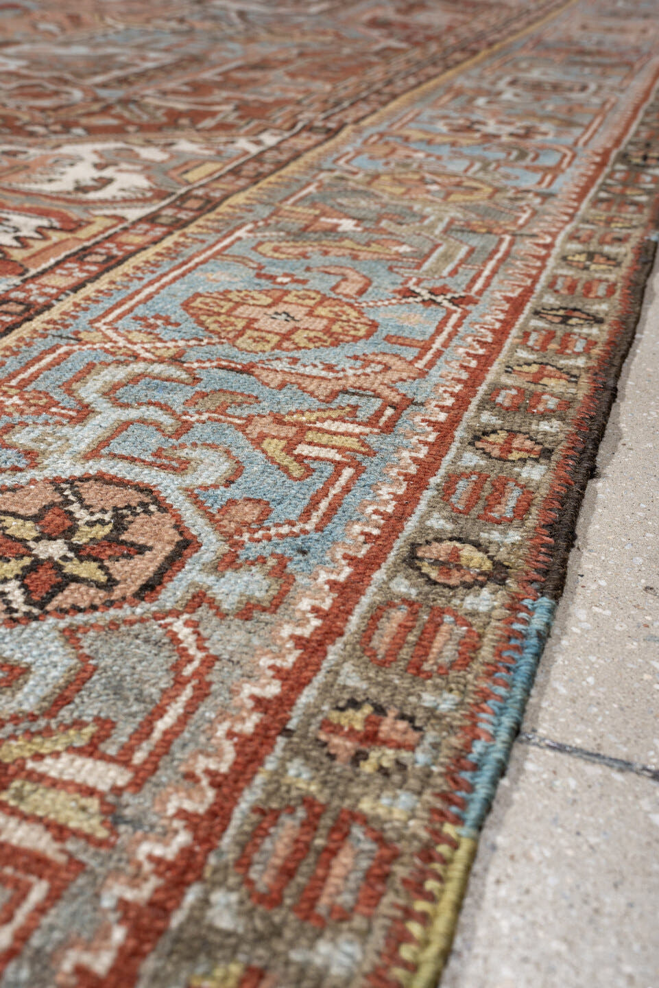 8' x 11' one-of-a-kind handmade antique Karaje large size rug. Color palette: sky blue, terracotta, ivory, rust, dusty rose
