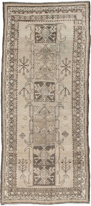 4' x 10' one-of-a-kind handmade antique Saraband runner rug. Color palette: ivory, taupe, brown, camel, charcoal, beige