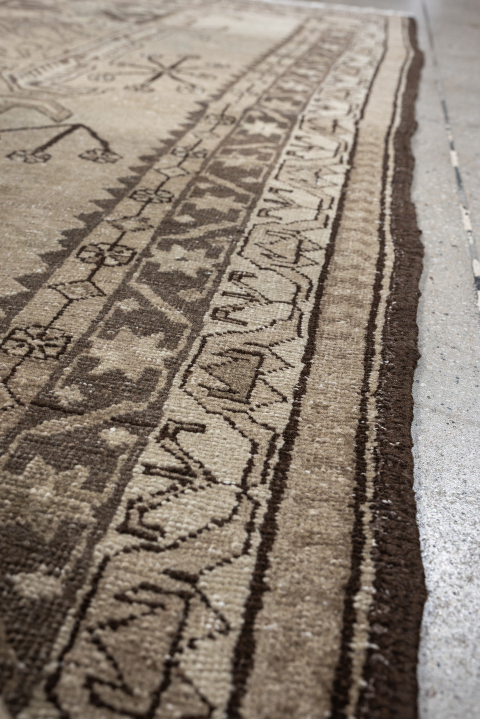 4' x 10' one-of-a-kind handmade antique Saraband runner rug. Color palette: ivory, taupe, brown, camel, charcoal, beige