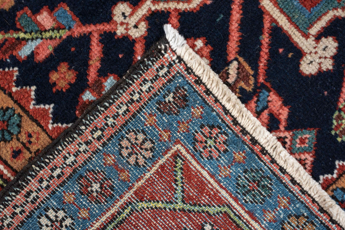 4' x 6' one-of-a-kind handmade antique Karaje rug. Color palette: rust, navy, sky blue, ivory, coral, camel, sage, charcoal