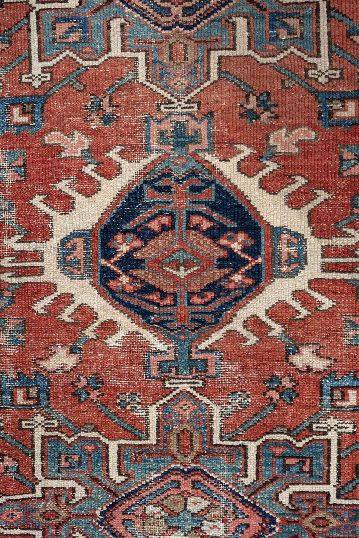 3' x 4' one-of-a-kind handmade antique Karaje small size rug. Color palette: terracotta, navy, ivory, light blue, rust