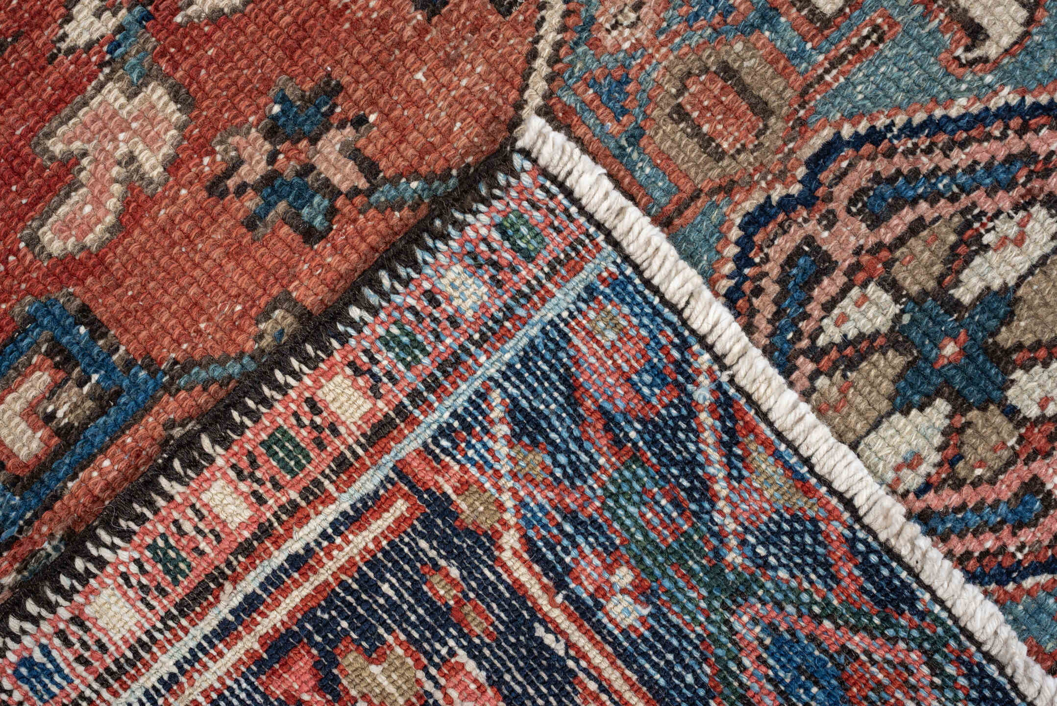3' x 4' one-of-a-kind handmade antique Karaje small size rug. Color palette: terracotta, navy, ivory, light blue, rust
