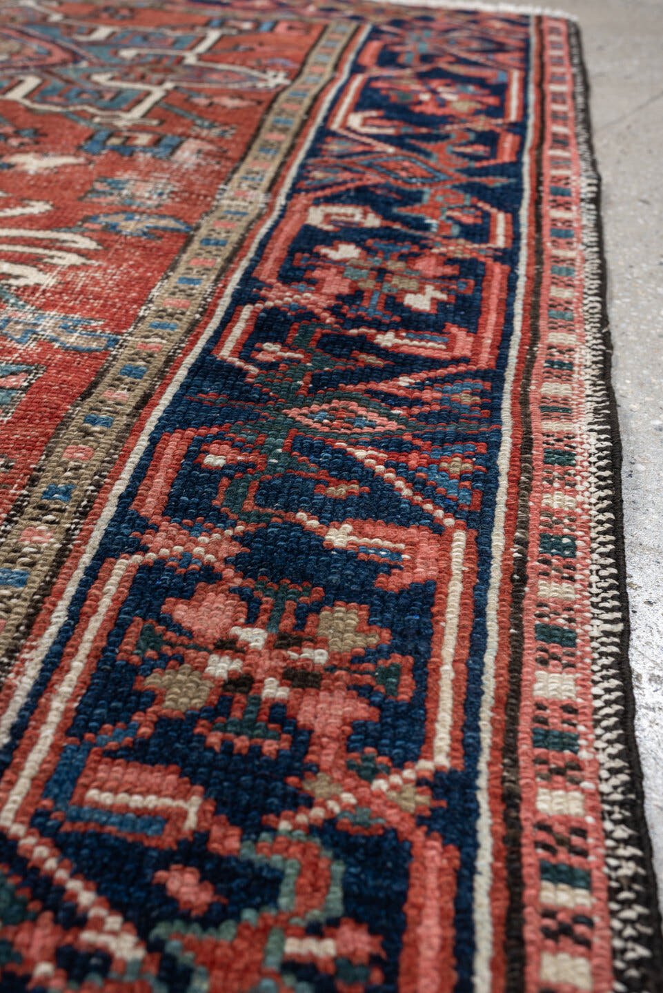 3' x 4' one-of-a-kind handmade antique Karaje small size rug. Color palette: terracotta, navy, ivory, light blue, rust