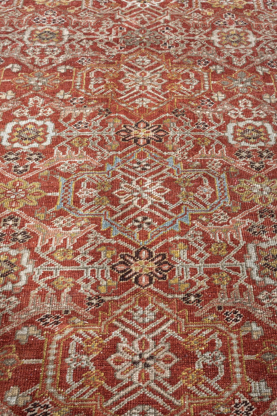 8' x 11' one-of-a-kind handmade antique Heriz large size rug. Color palette: rust, powder blue, ivory, terracotta, taupe