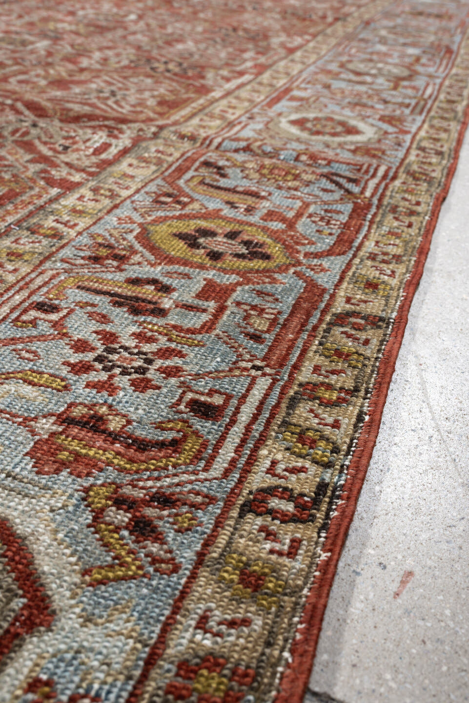 8' x 11' one-of-a-kind handmade antique Heriz large size rug. Color palette: rust, powder blue, ivory, terracotta, taupe
