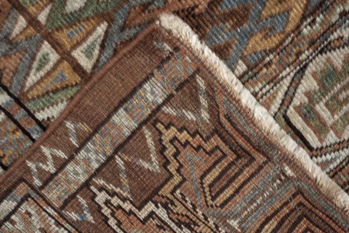 7' x 10' one-of-a-kind handmade antique Yamoud large size rug. Color palette: brown, camel, ivory, muted teal, rust, taupe