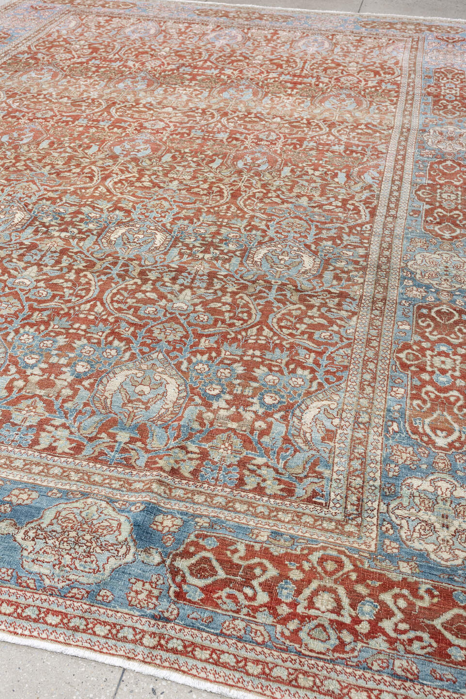 9' x 12' one-of-a-kind handmade antique Baktiary large size rug. Color palette: rust, sky blue, ivory, sage, terracotta