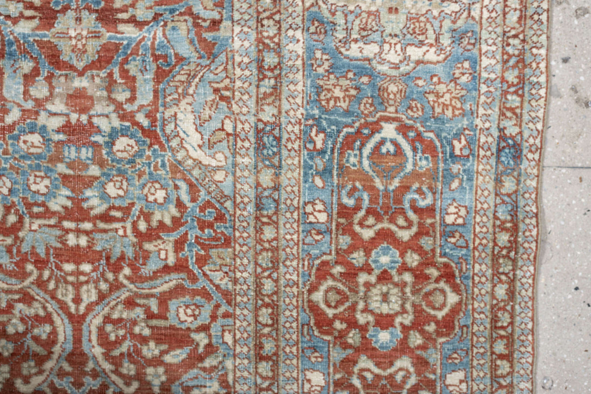 9' x 12' one-of-a-kind handmade antique Baktiary large size rug. Color palette: rust, sky blue, ivory, sage, terracotta
