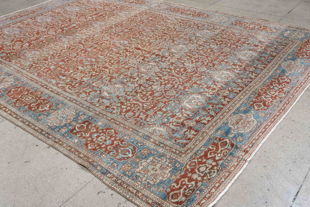 9' x 12' one-of-a-kind handmade antique Baktiary large size rug. Color palette: rust, sky blue, ivory, sage, terracotta