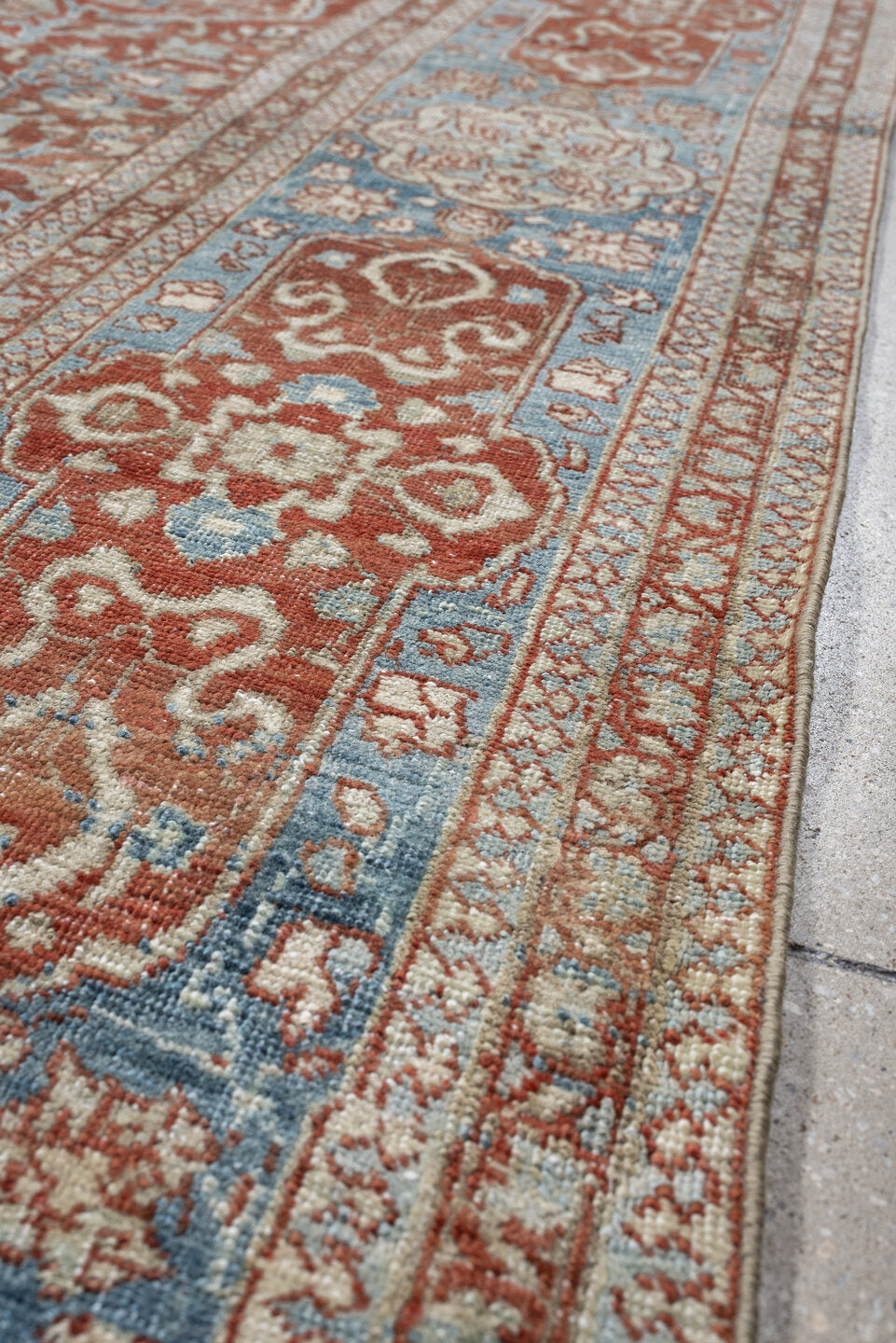 9' x 12' one-of-a-kind handmade antique Baktiary large size rug. Color palette: rust, sky blue, ivory, sage, terracotta