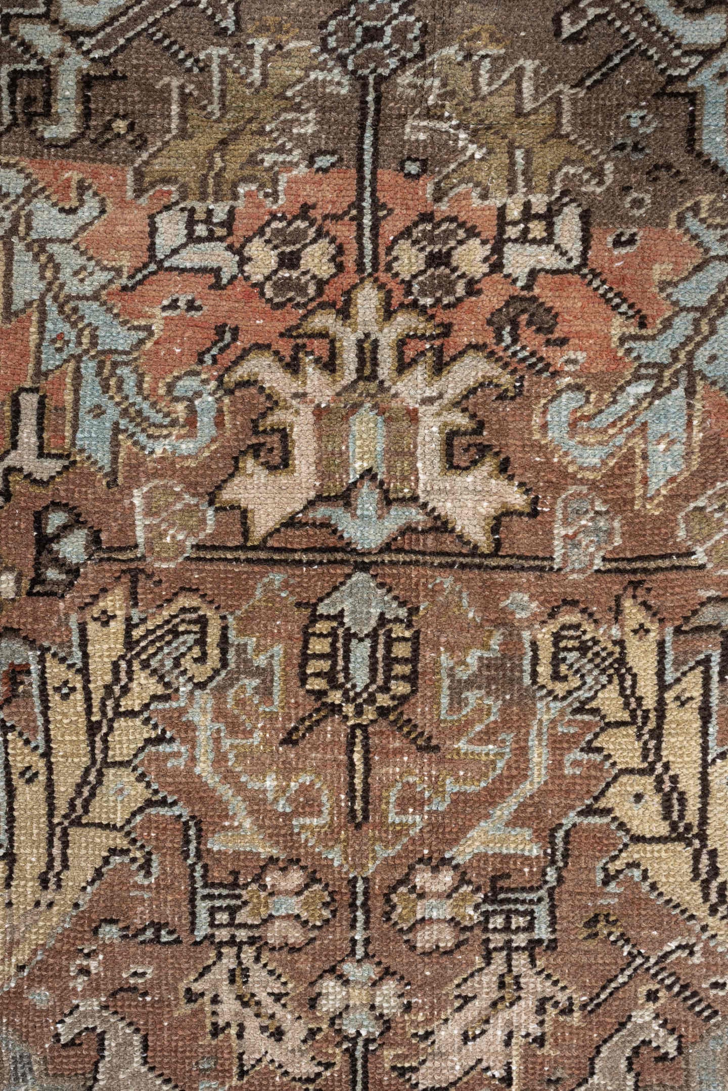 5' x 8' one-of-a-kind handmade antique Heriz medium size rug. Color palette: terra cotta, charcoal, ivory, olive, camel