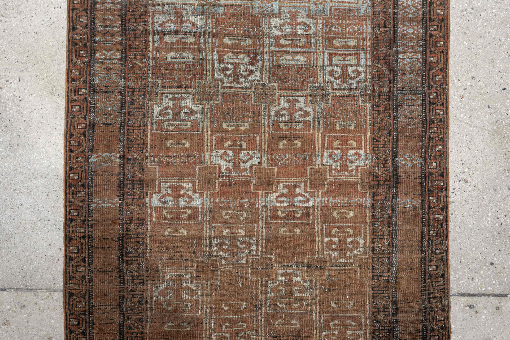 2' x 5' one-of-a-kind handmade antique Belouch small size rug. Color palette: camel, rust, pale blue, ivory, charcoal, taupe