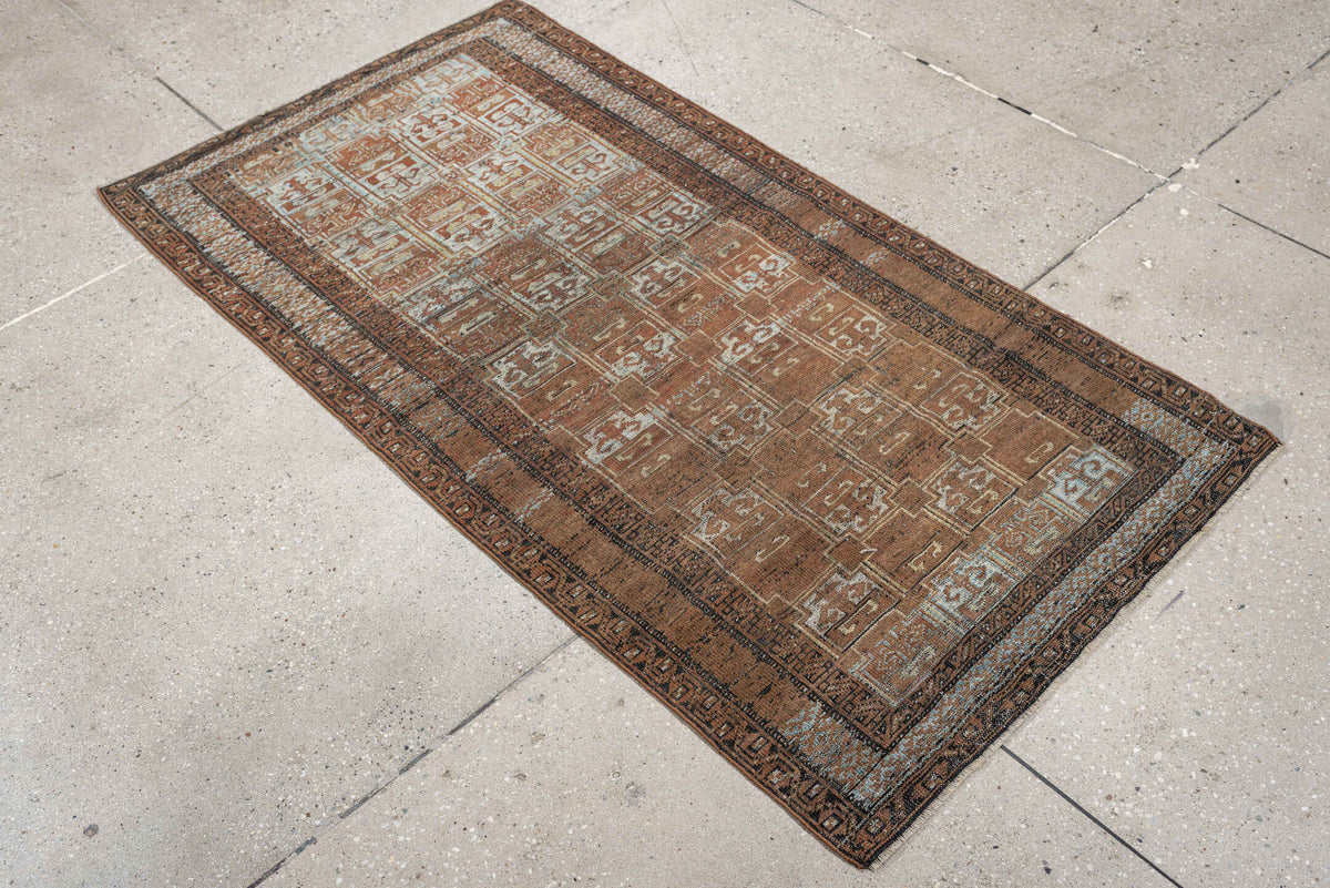2' x 5' one-of-a-kind handmade antique Belouch small size rug. Color palette: camel, rust, pale blue, ivory, charcoal, taupe