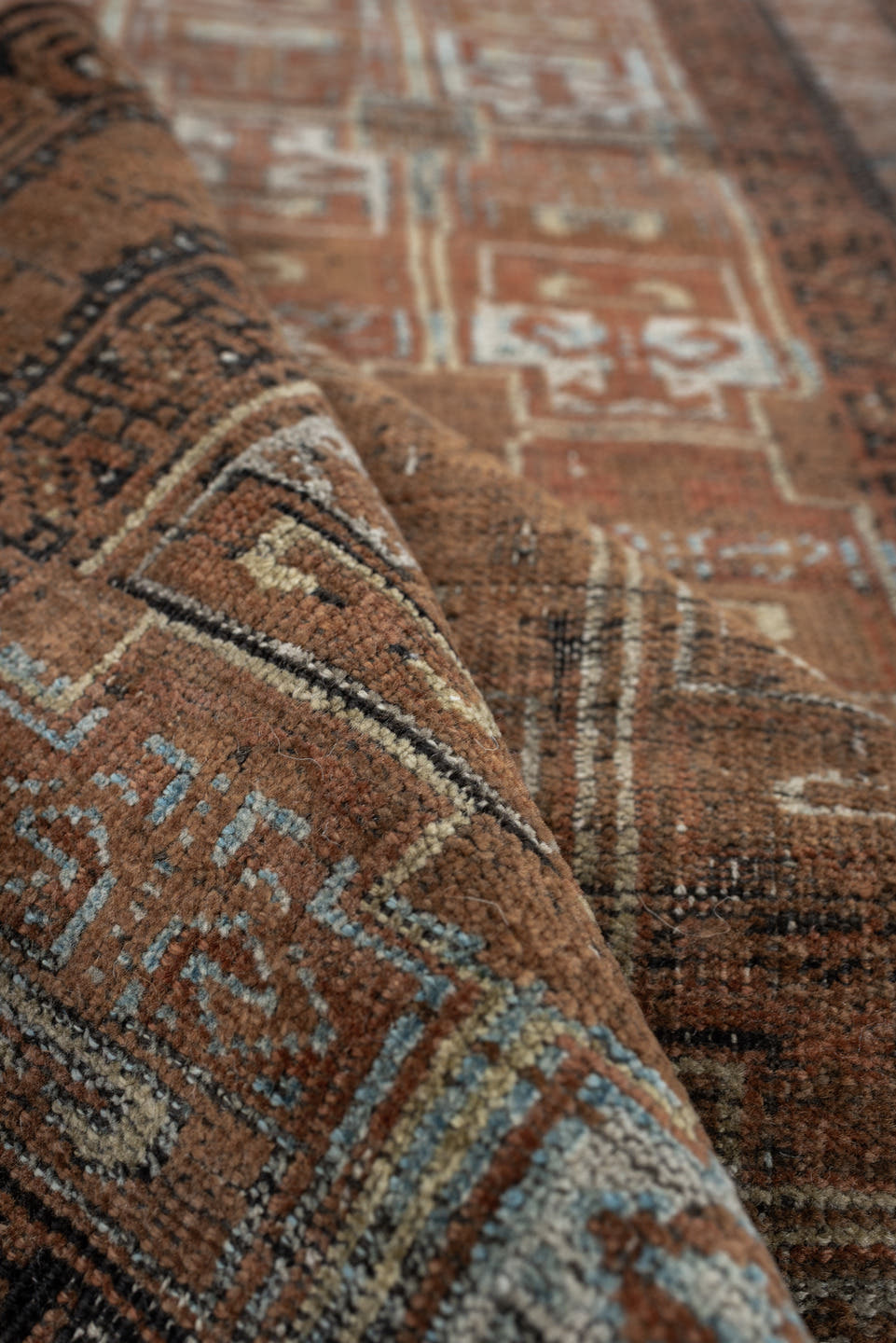 2' x 5' one-of-a-kind handmade antique Belouch small size rug. Color palette: camel, rust, pale blue, ivory, charcoal, taupe