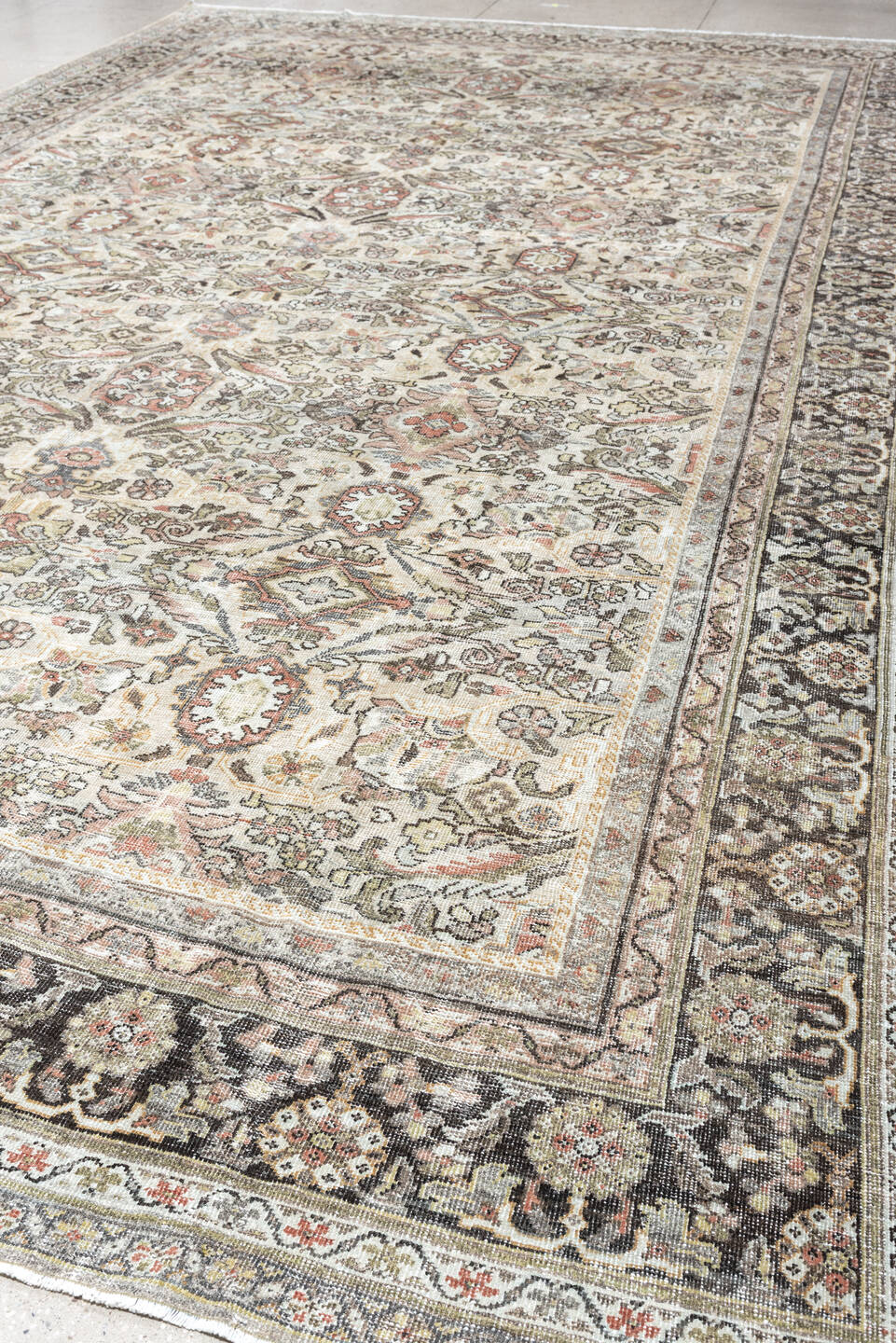 10' x 17' one-of-a-kind handmade antique Mahal oversize rug. Color palette: ivory, charcoal, sage, dusty rose, terracotta