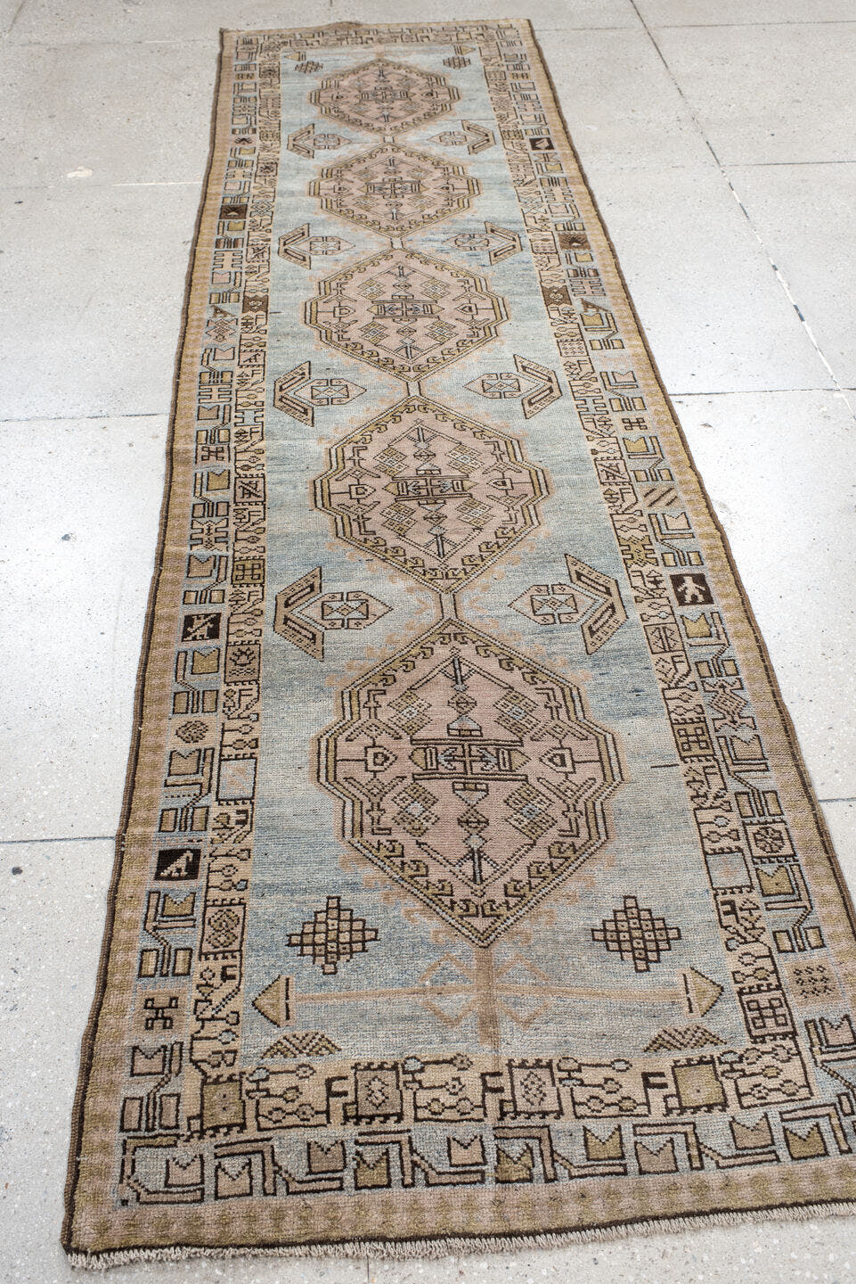 3' x 11' one-of-a-kind handmade vintage Anatolian runner rug. Color palette: ivory, sky blue, taupe, brown, camel, charcoal
