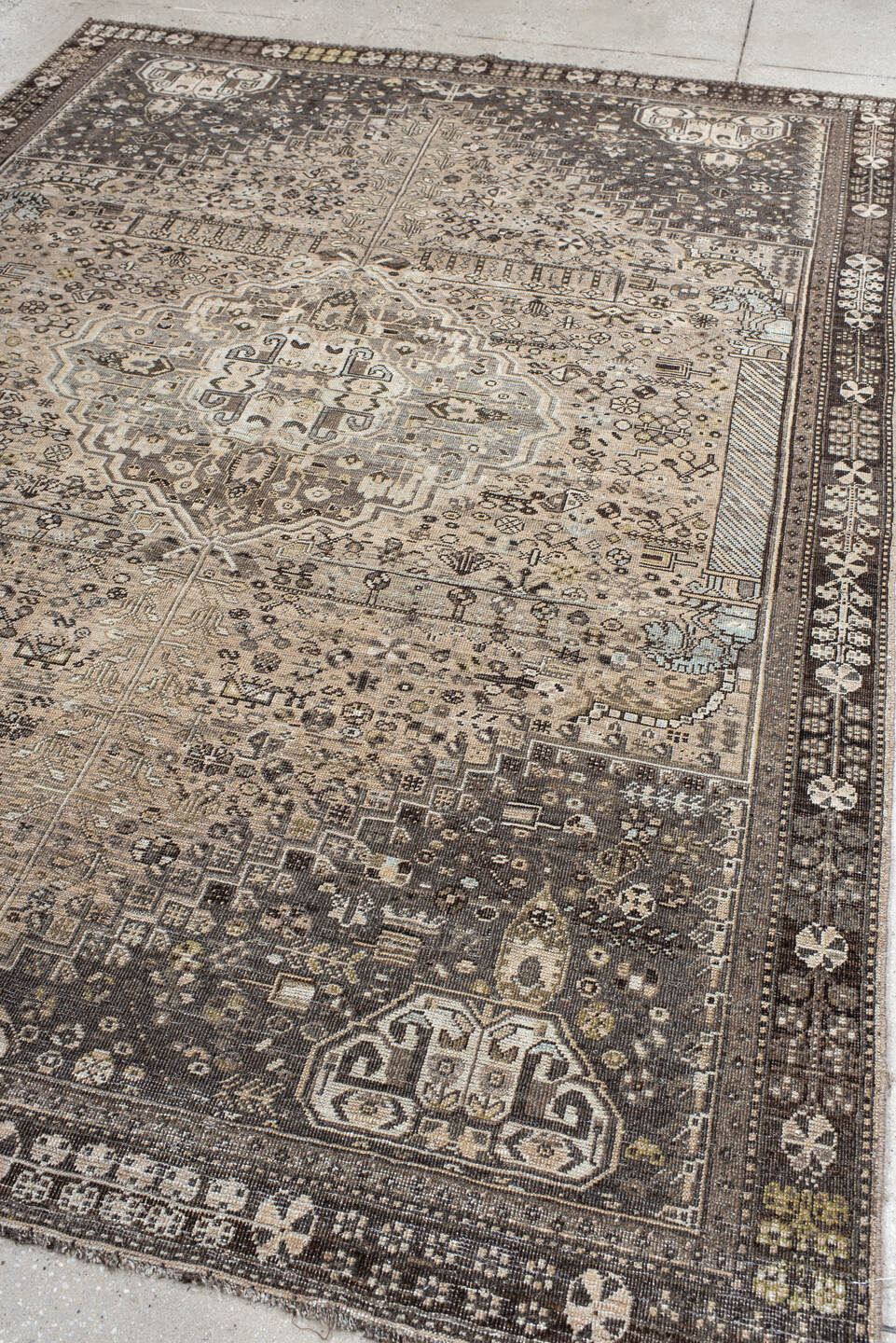 6' x 9' one-of-a-kind handmade vintage Shiraz medium size rug. Color palette: taupe, charcoal, ivory, brown, slate, cream