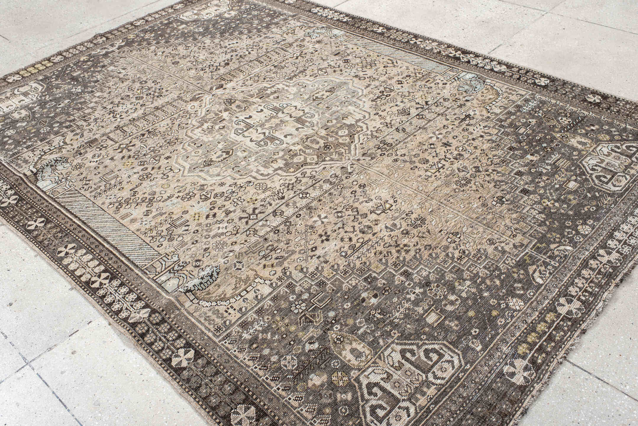 6' x 9' one-of-a-kind handmade vintage Shiraz medium size rug. Color palette: taupe, charcoal, ivory, brown, slate, cream
