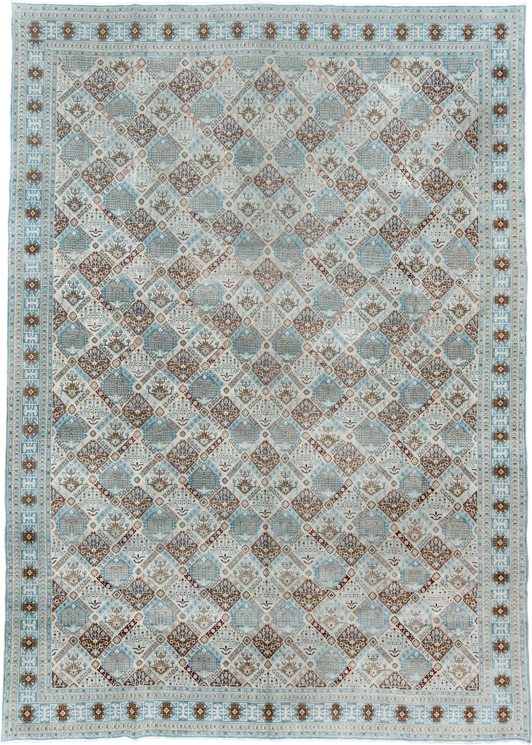 11' x 15' one-of-a-kind handmade vintage Qum oversize rug. Color palette: ivory, sky blue, brown, camel, taupe, rust