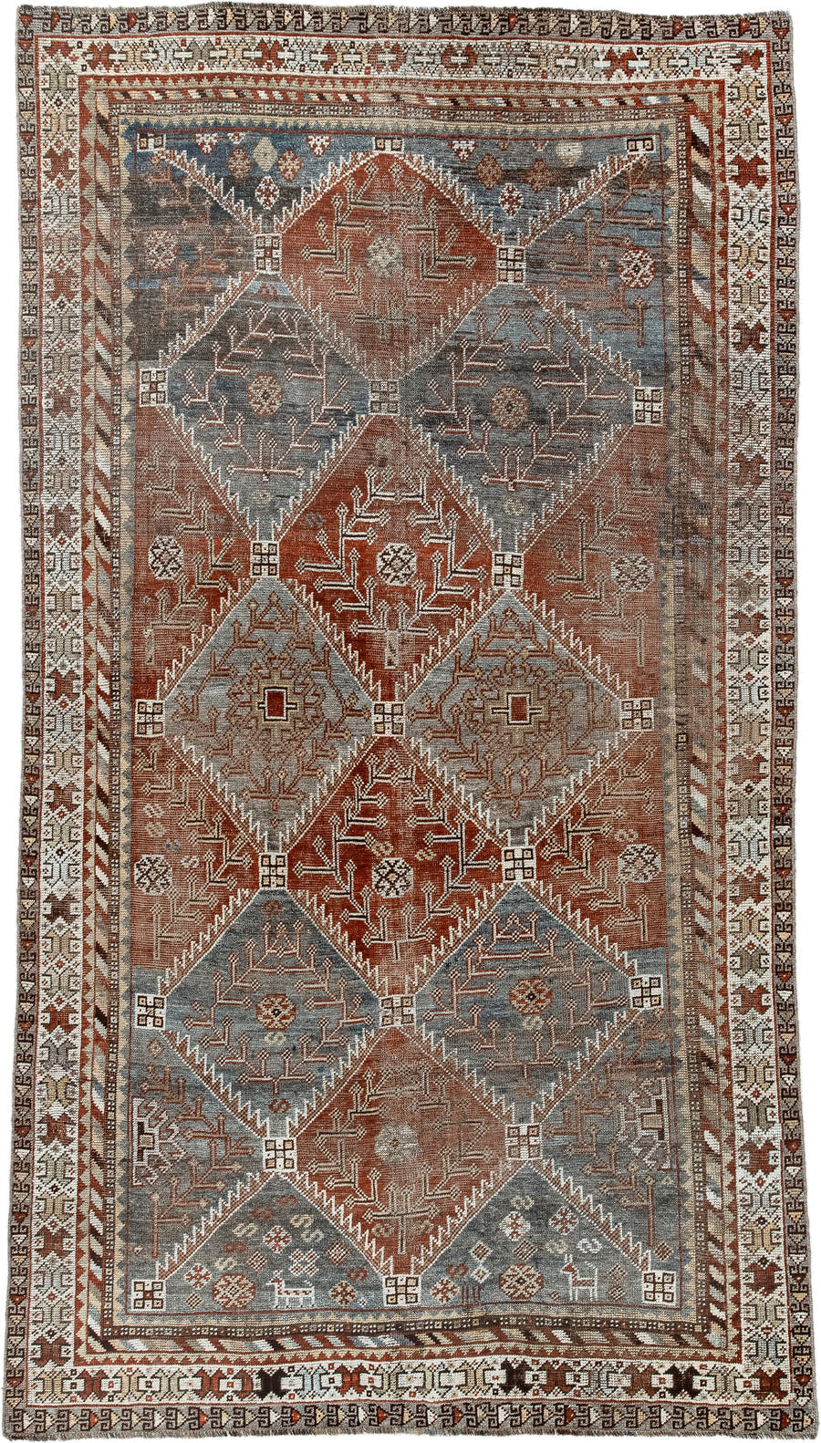 4' x 9' one-of-a-kind handmade antique Shiraz rug. Color palette: rust, sky blue, ivory, brown, taupe, charcoal, terracotta