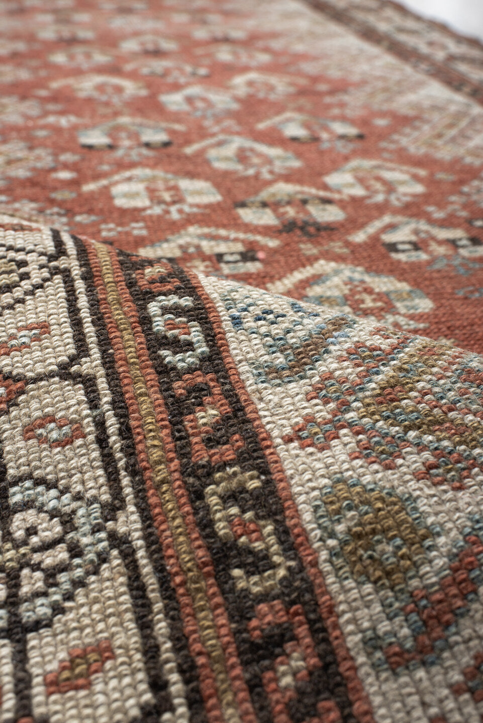 2' x 10' one-of-a-kind handmade vintage Malayer runner rug. Color palette: black, brown, gray