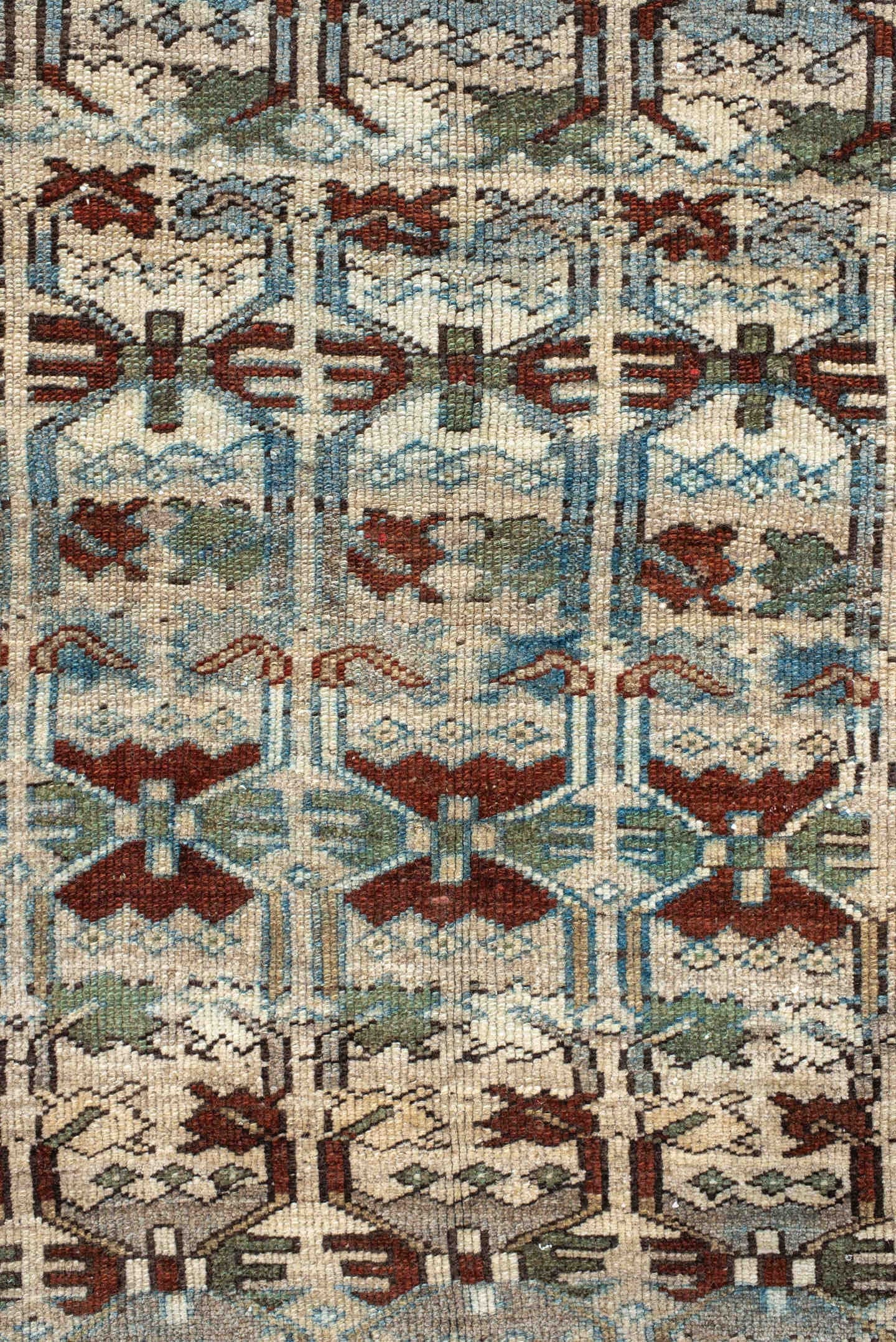 4' x 10' one-of-a-kind handmade vintage NW Persian runner rug. Color palette: ivory, rust, sky_blue, sage, taupe, brown