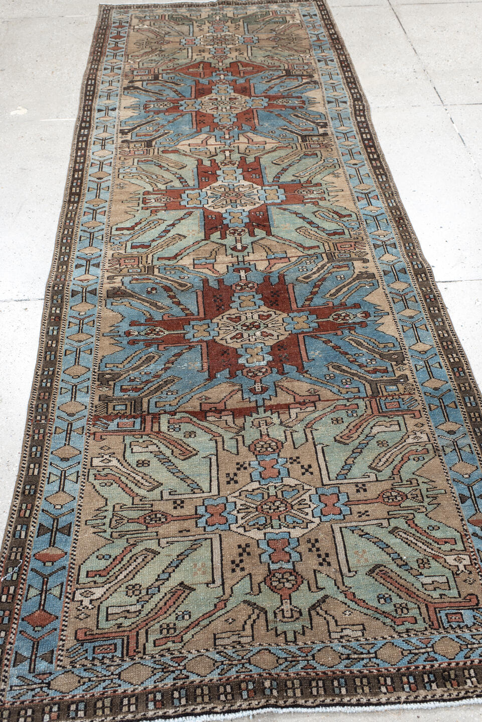 3' x 10' one-of-a-kind handmade vintage Sarab runner rug. Color palette: sky blue, ivory, rust, brown, taupe, charcoal