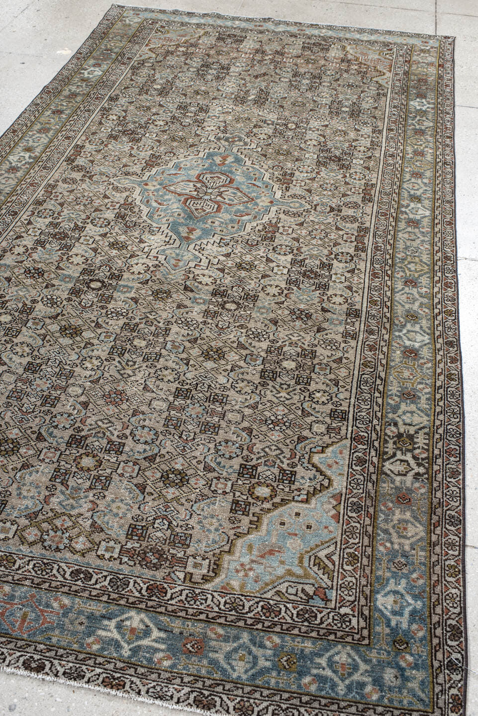 5' x 9' one-of-a-kind handmade vintage Malayer medium size rug. Color palette: ivory, sky blue, brown, rust, charcoal, taupe