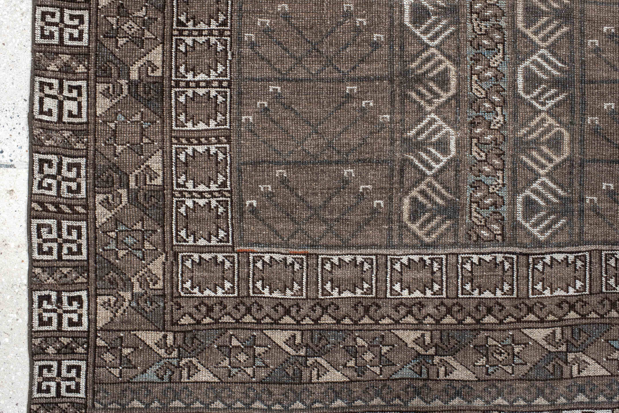 4' x 6' one-of-a-kind handmade vintage Belouch small size rug. Color palette: taupe, brown, ivory, charcoal, camel, slate
